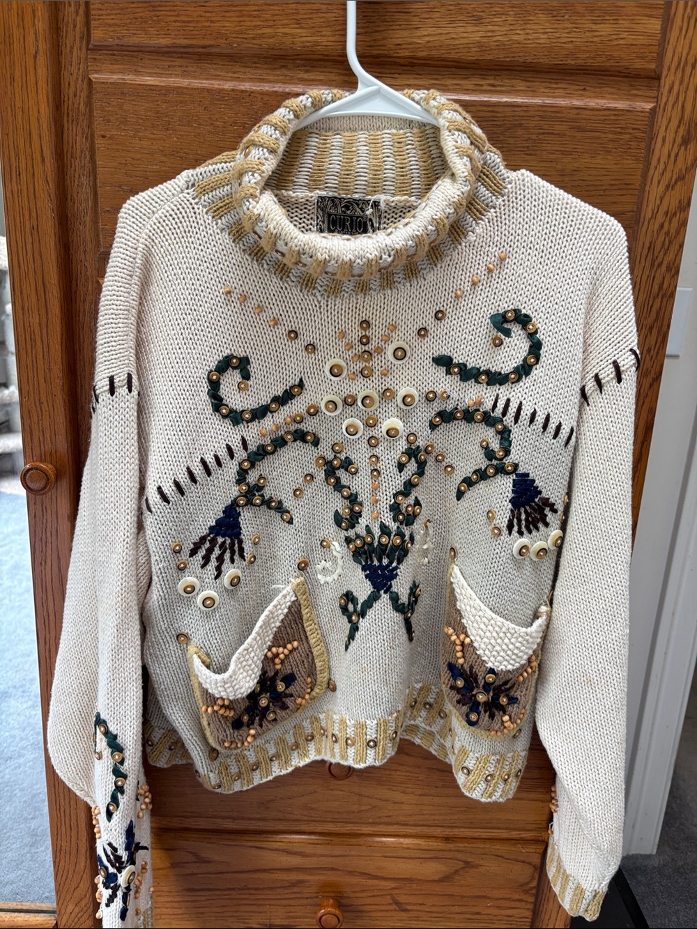 Curio Ivory Embellished Turtleneck Sweater with Decorative Pockets
